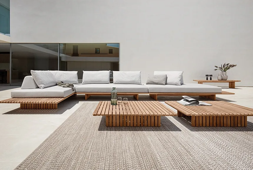 Gloster teak platform sofa with low slatted tables